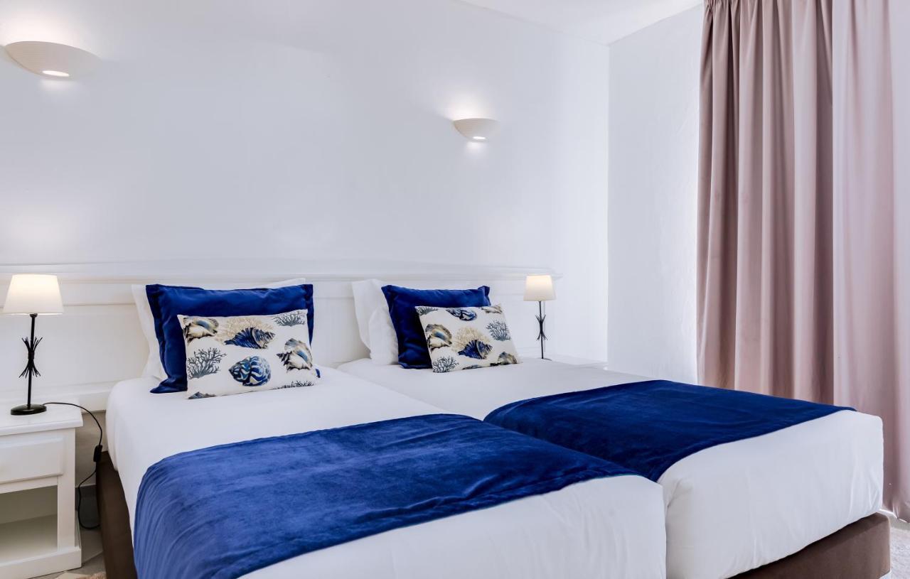 Quarto Triplo (3 Adultos)