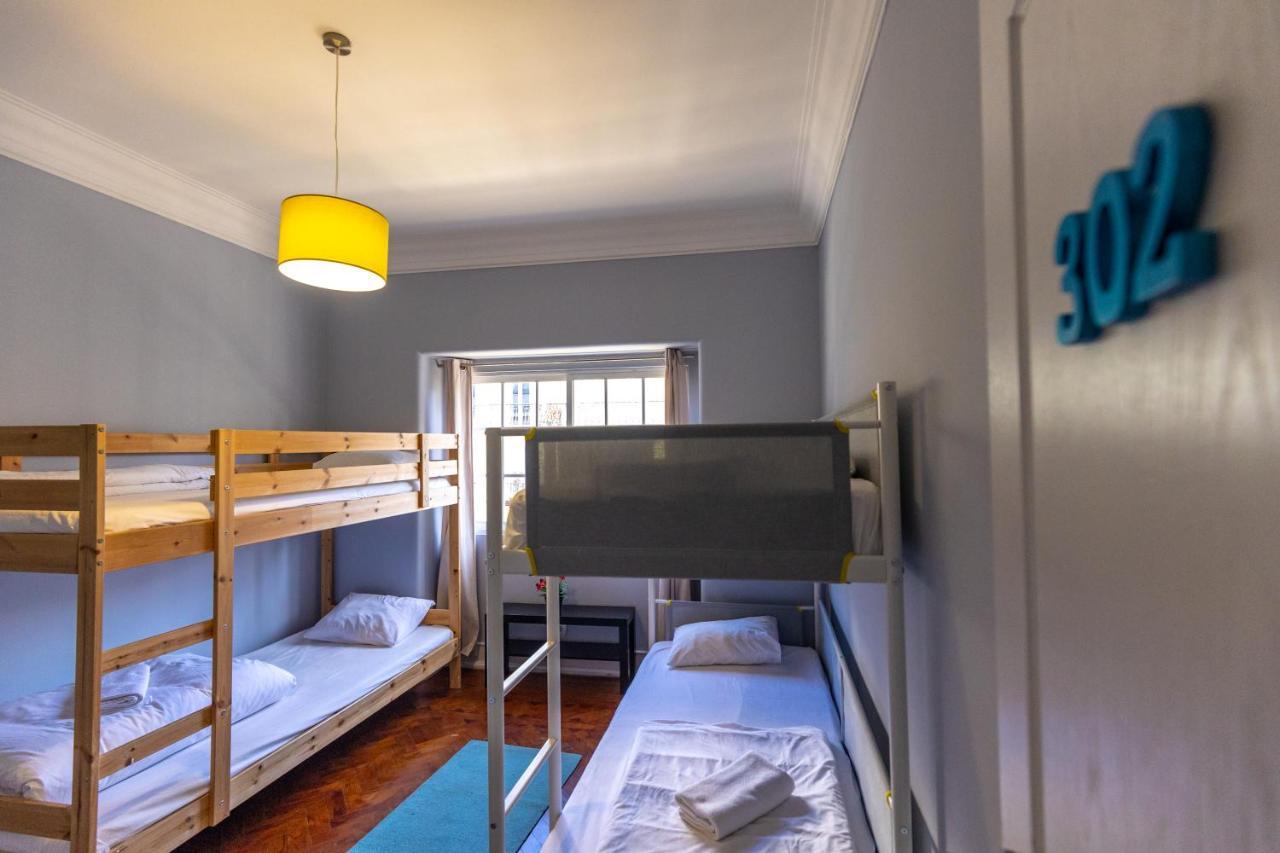 Quarto Quádruplo com Casa de Banho Partilhada