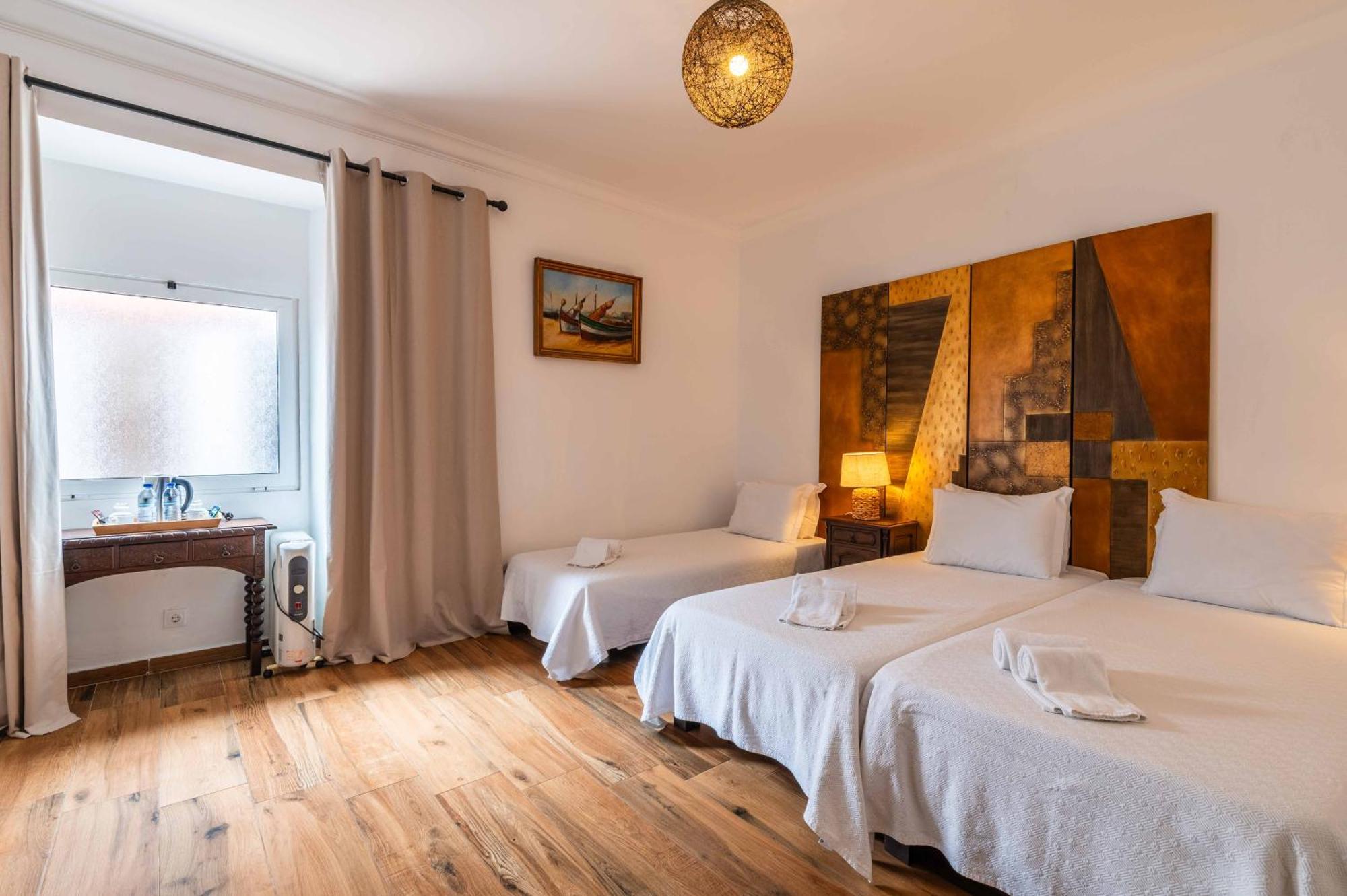 Dreibettzimmer mit eigenem Bad