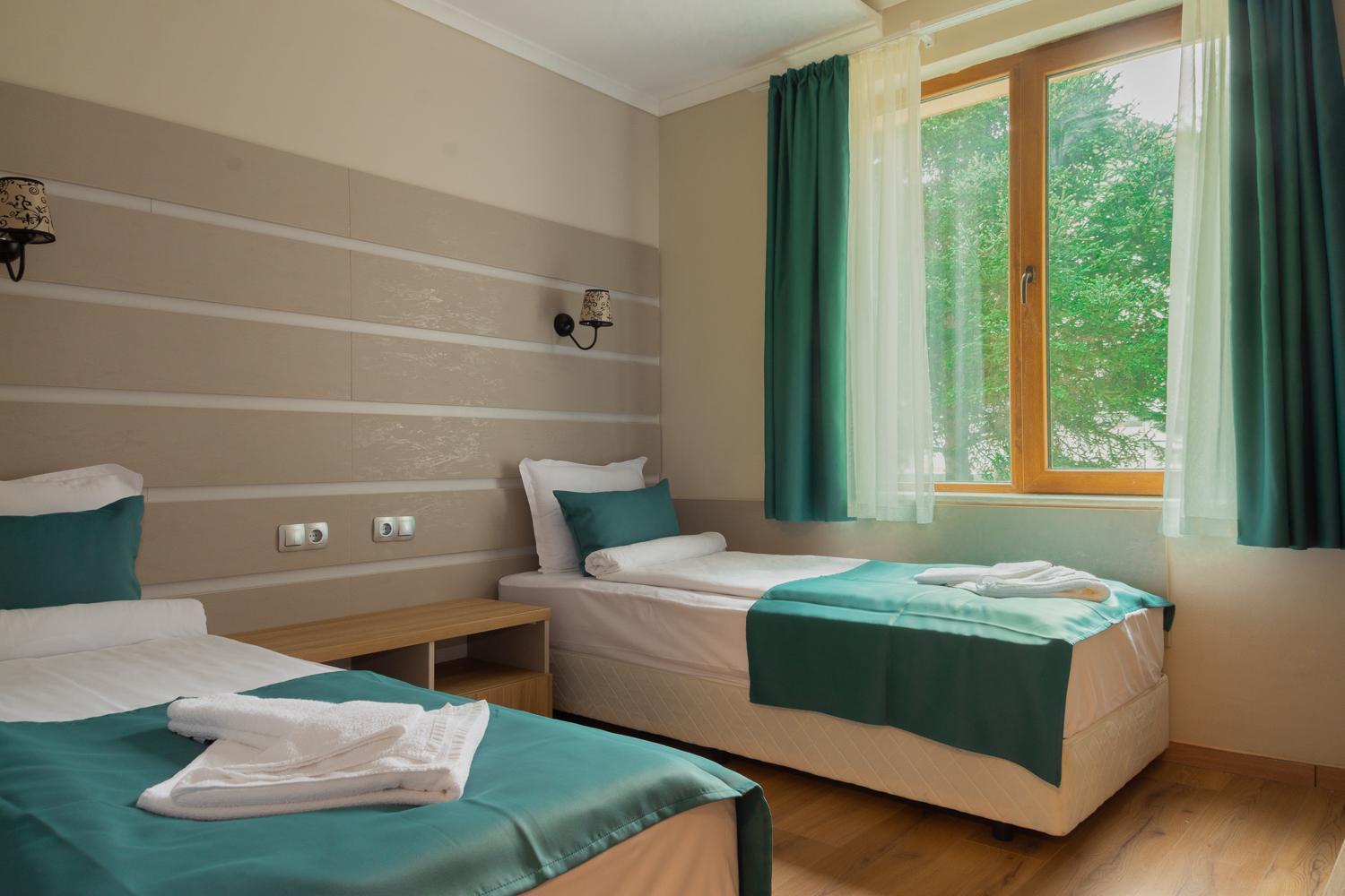 Doppel- oder Zweibettzimmer