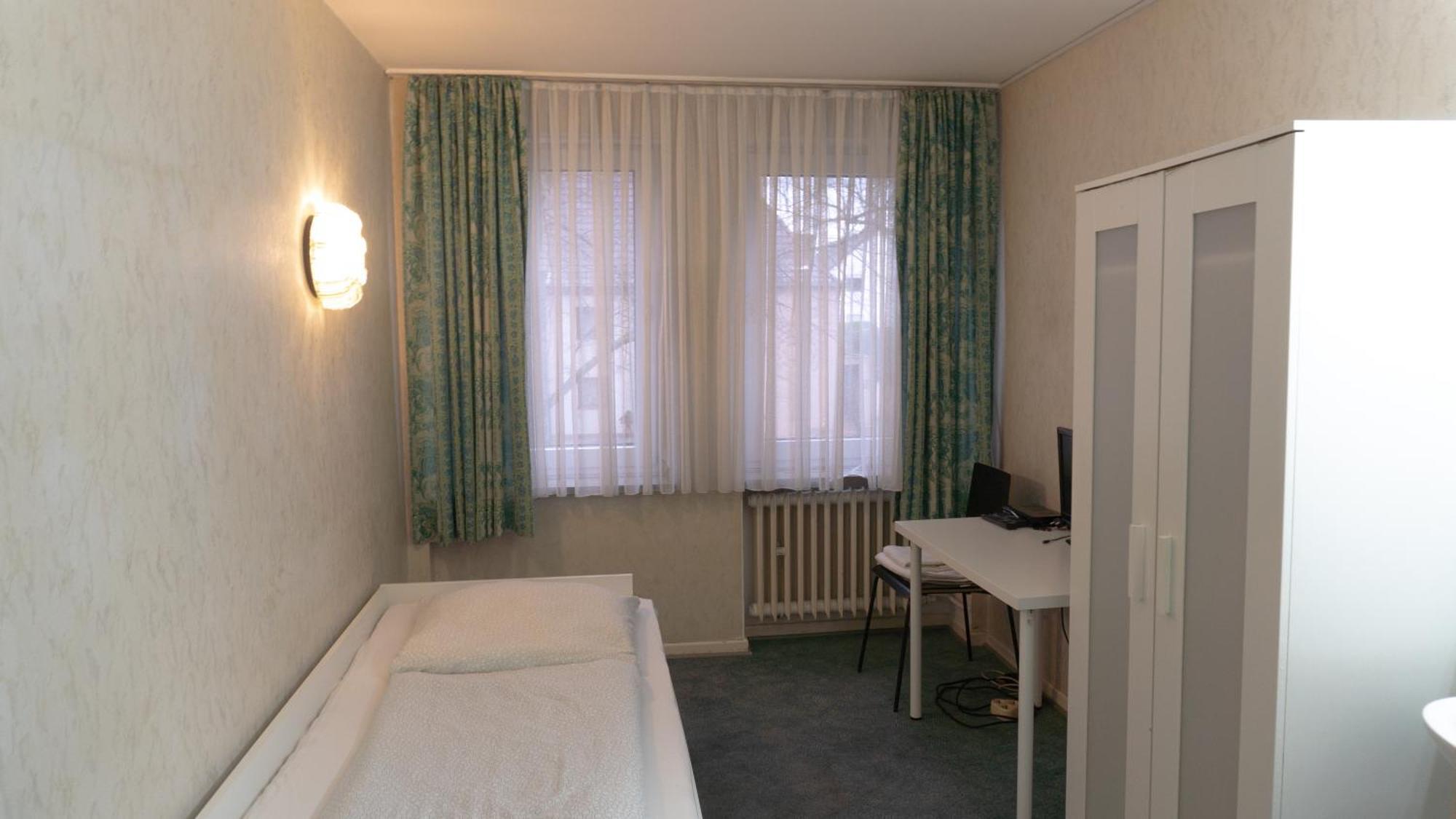 Eenpersoonskamer met Gedeelde Badkamer