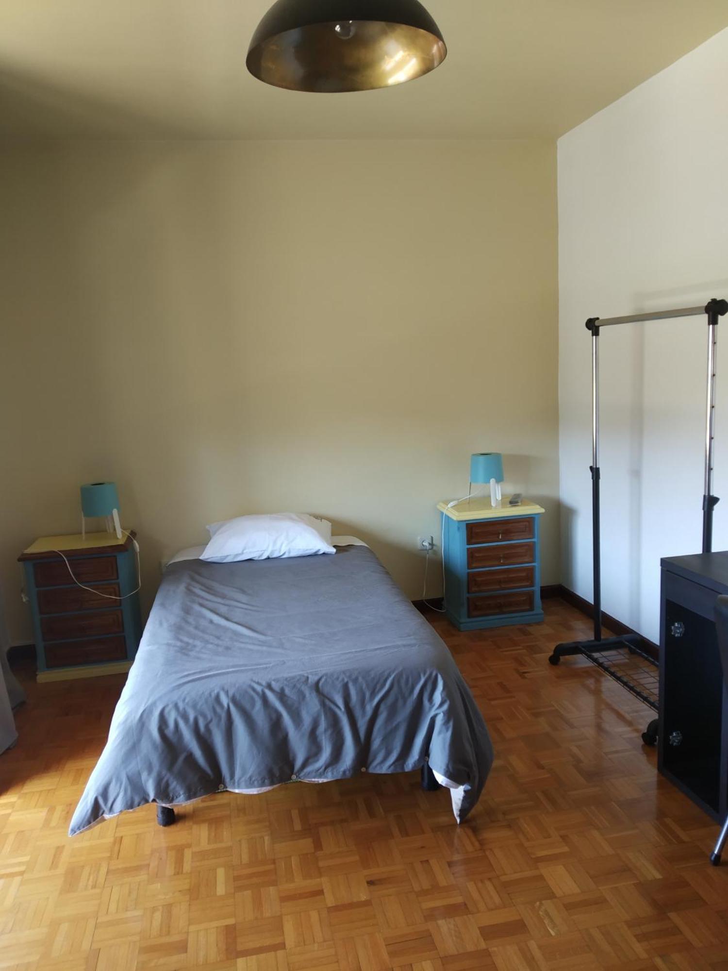 Quarto Individual com Varanda