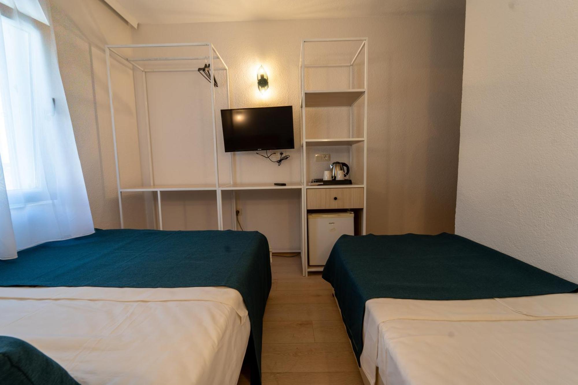 Chambre Triple - Vue sur Ville