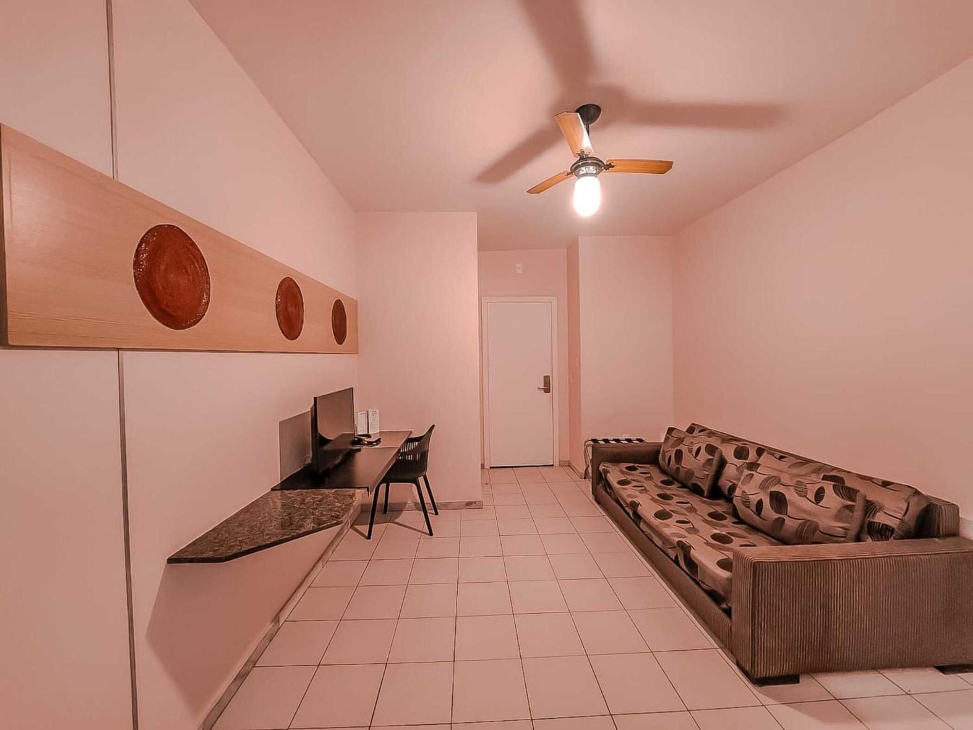 Triple Room with Two Single Beds and Sofa Bed