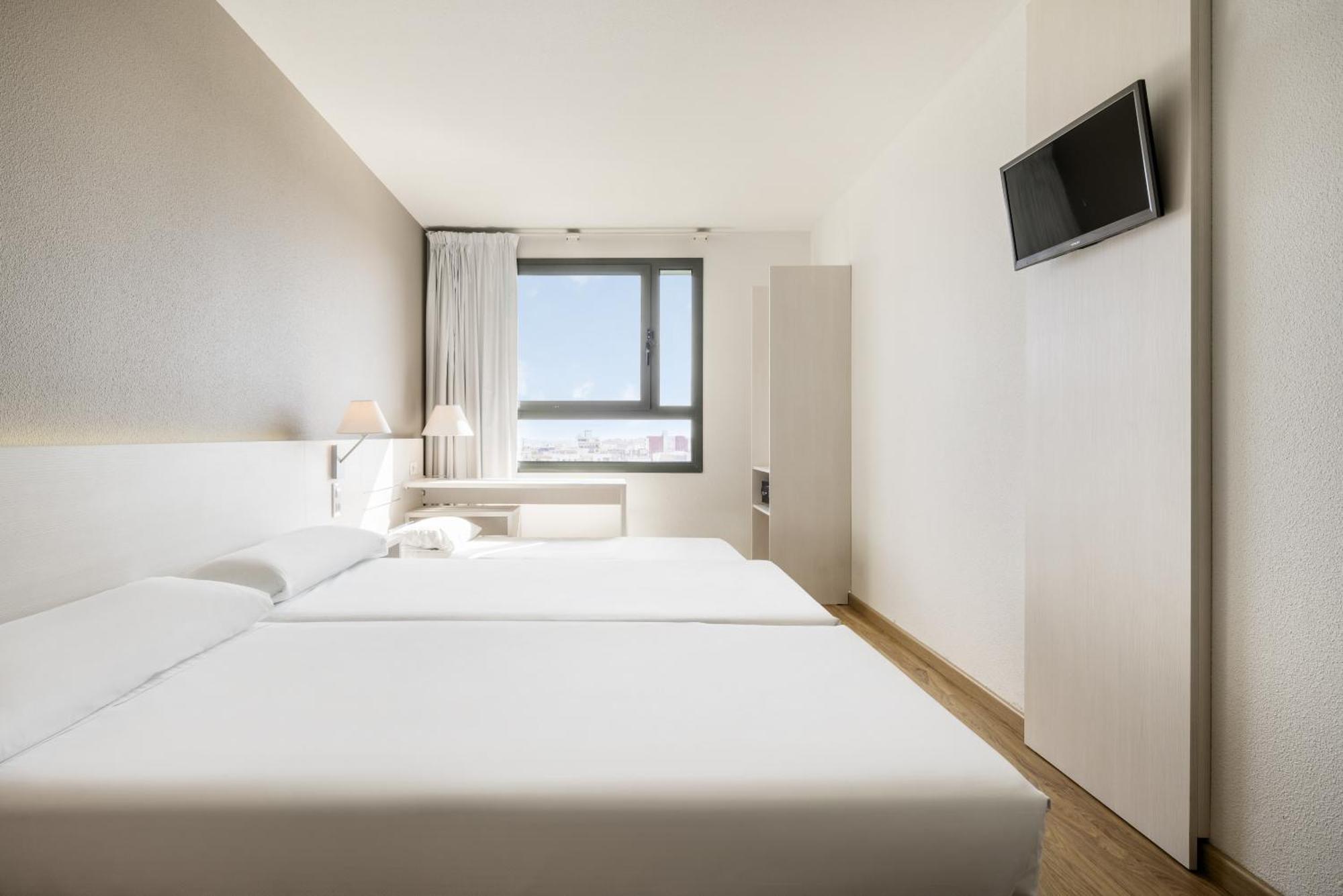 Chambre Triple Standard (2 Adultes + 1 Enfant)