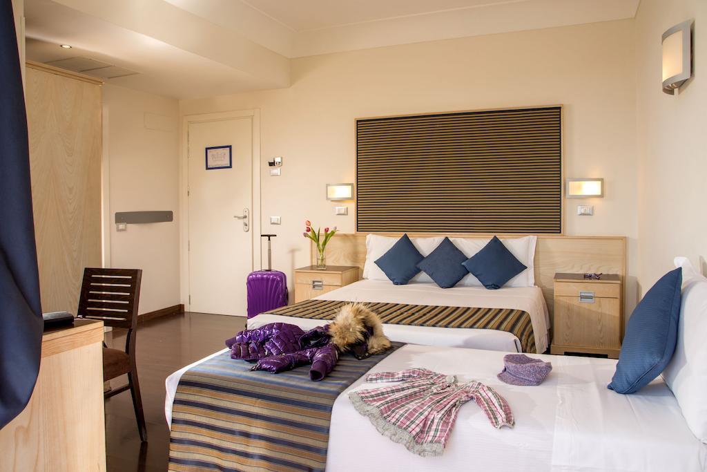 Quarto Triplo com Varanda